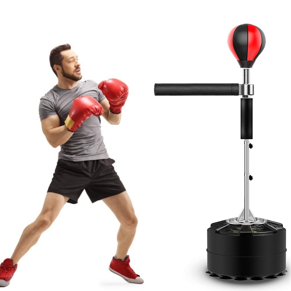 Rotating vertical trainer with boxing ball reaction target